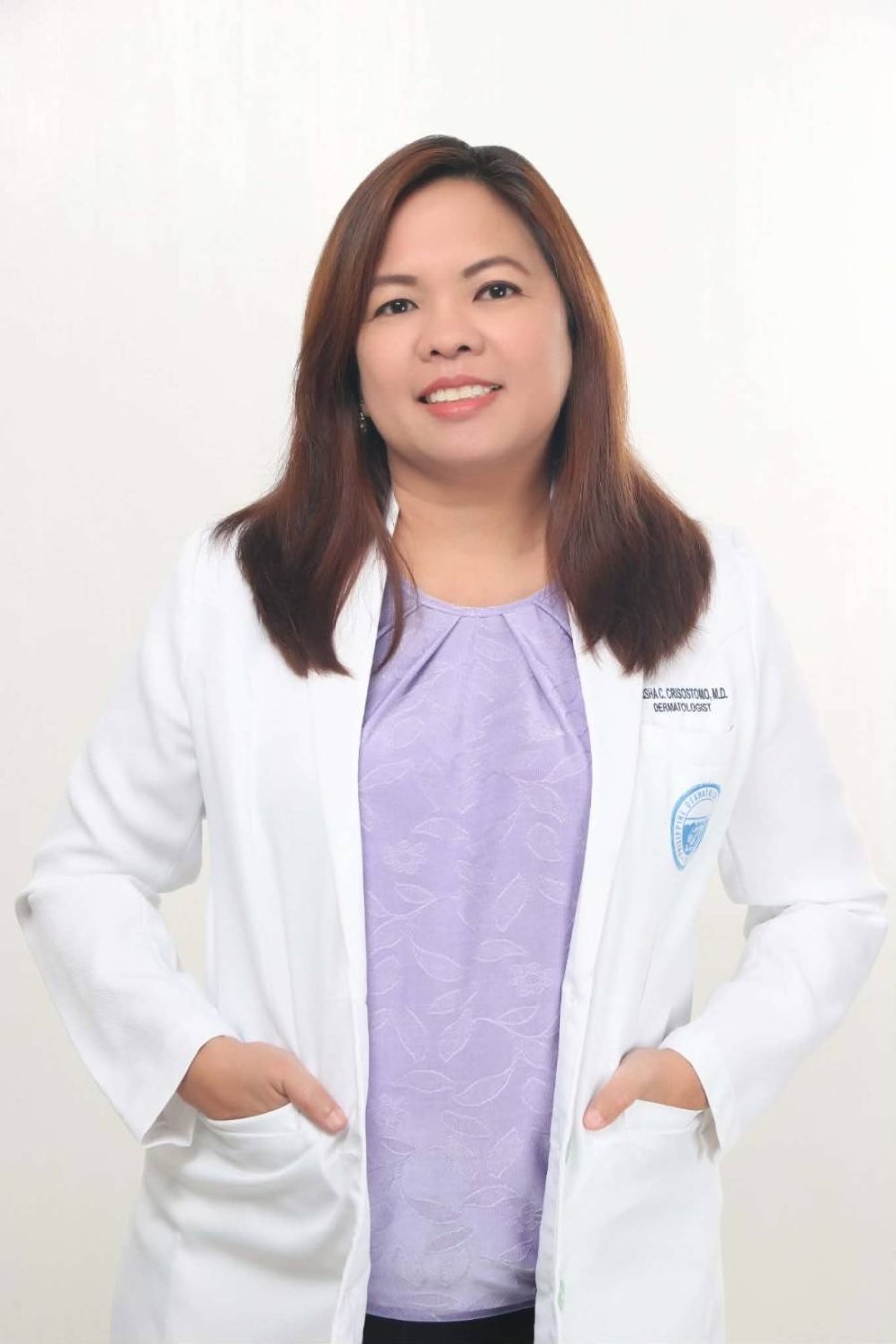 Dr. Trisha C. Crisostomo, M.D., FPDS, dermatologist at Skinique